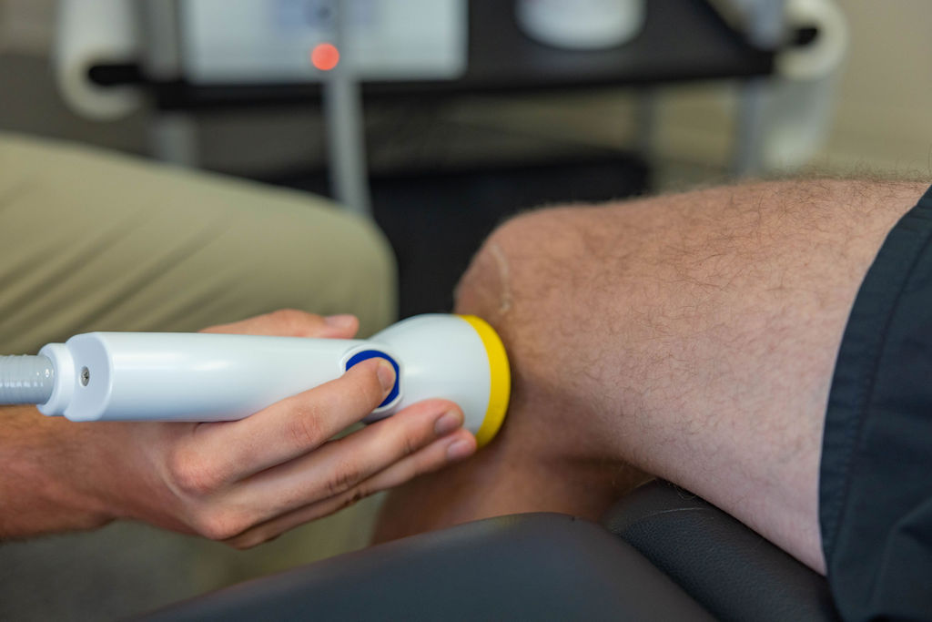 Softwave therapy treating knee pain in fort collins