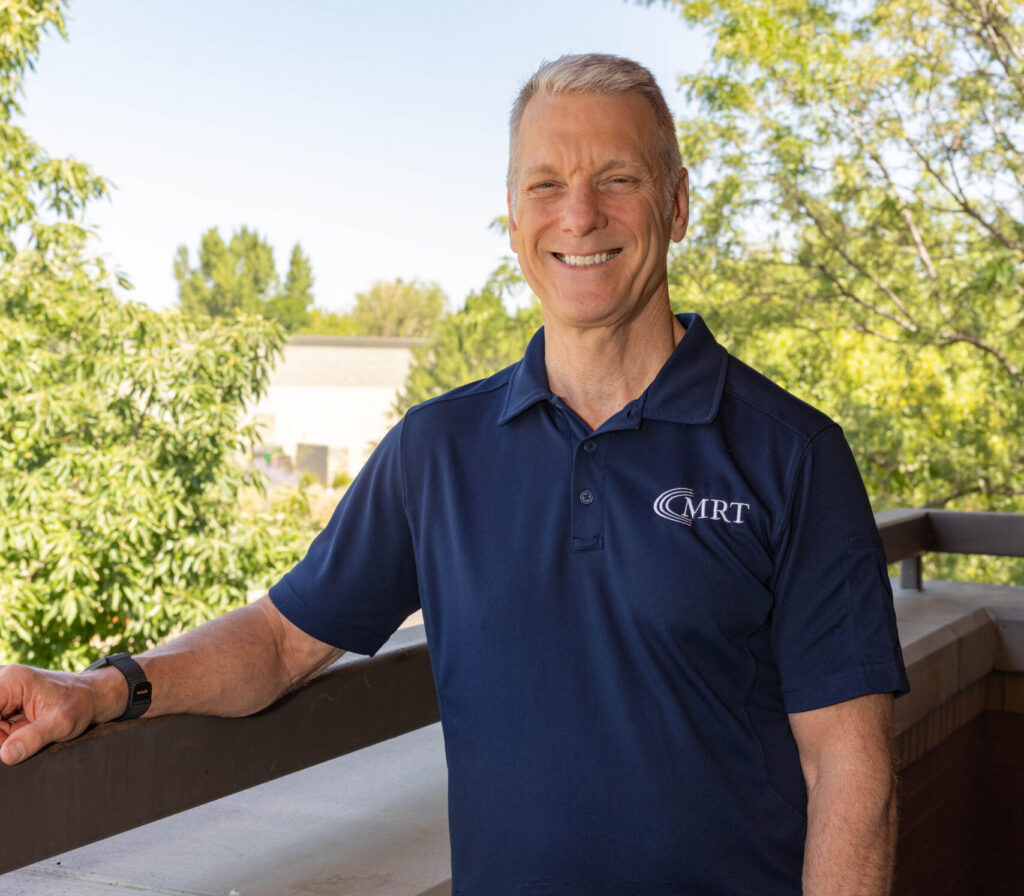 Mark Rise evaluating shoulder pain at Muscle Restoration Therapy, Fort Collins.